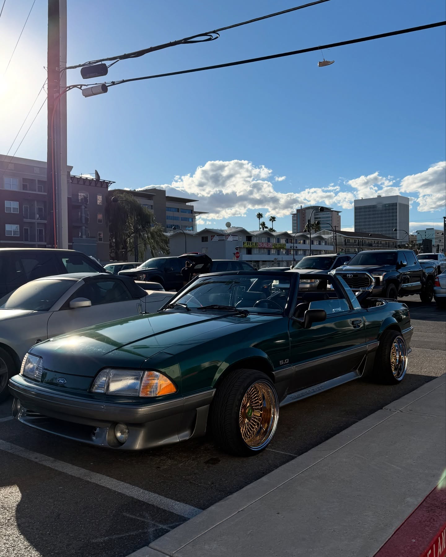 Green 5.0 Mustang with gold wire wheels